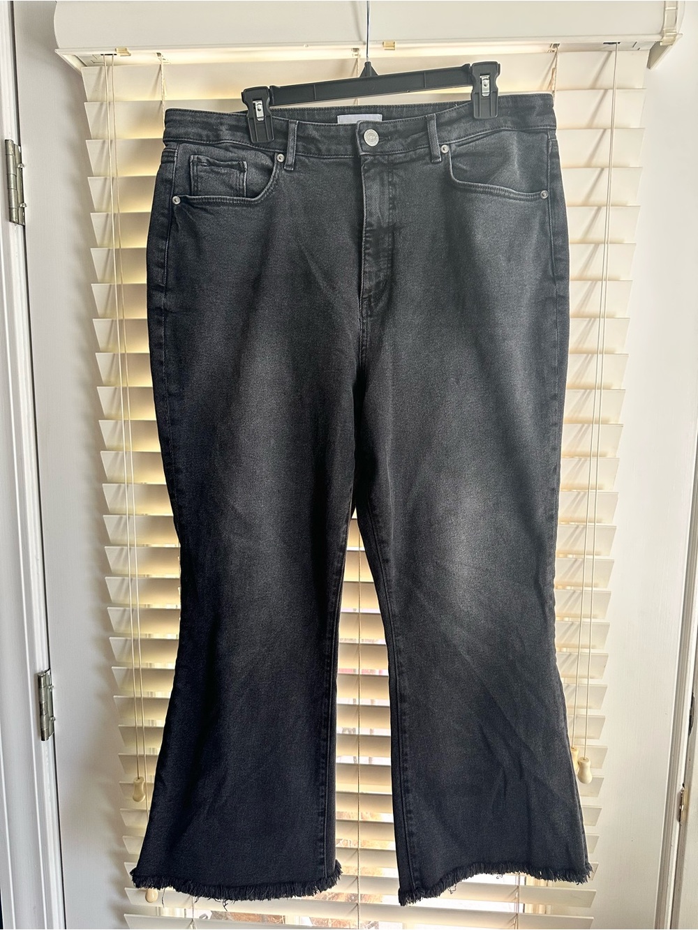LOFT Black High-Rise Flare Jeans with Raw Hem